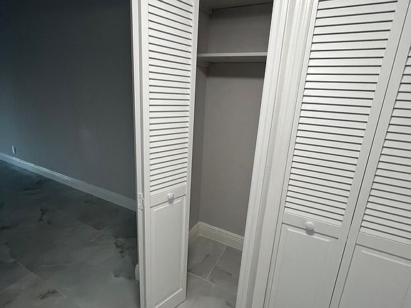 Storage closet in entryway