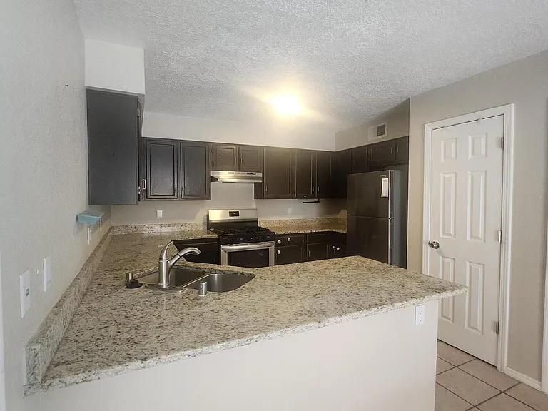 7720 Ranchwood Dr NW — Photo 6