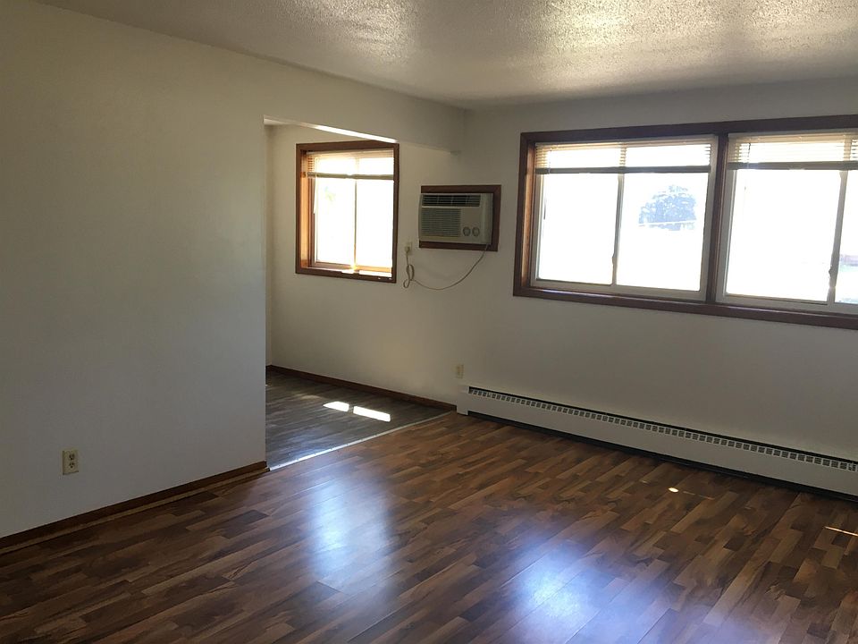 Living room looking into dining area