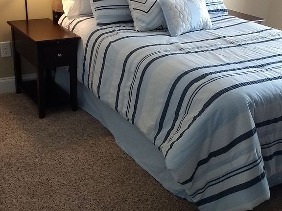 Furnished Bedroom w/ Full Size Bed
