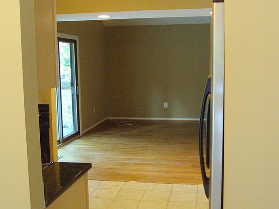 Family Room from Kitchen.  Sliding doors to wrap-around deck visible to left.