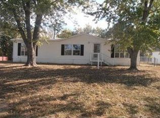 107 S Lyne St, Raymore, MO 64083