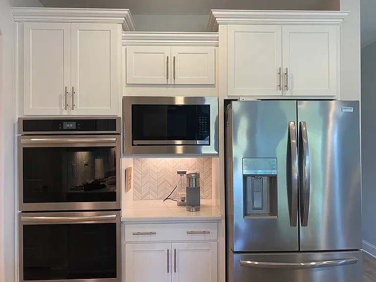 Kitchen with Keurig coffee nook. Double ovens.