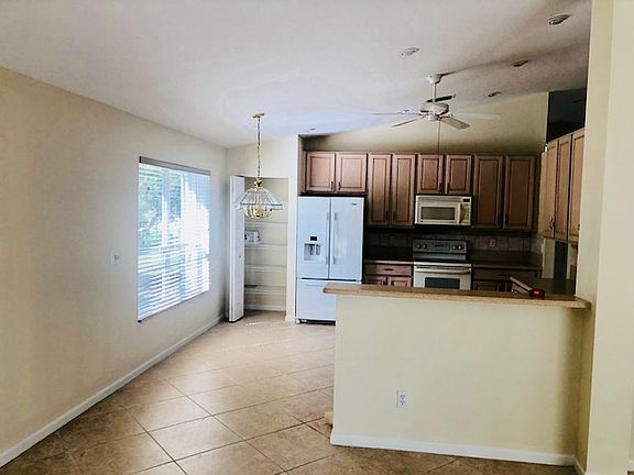 4th image of 6956 SE Twin Oaks Cir