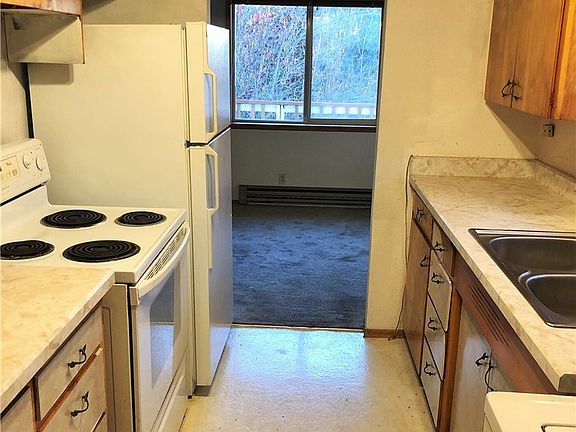 Appliances are functional, but updates are needed - priced to reflect