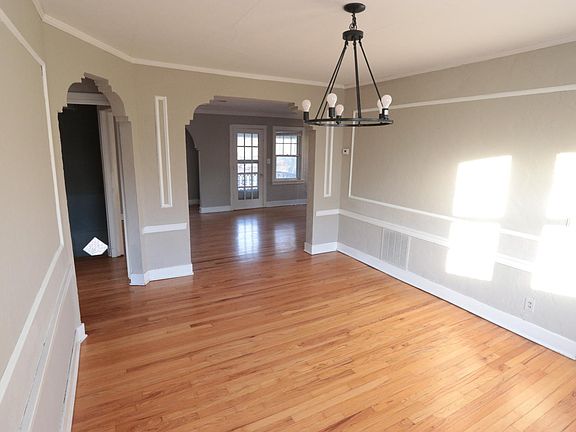 Dining Room Looking north into living room and porch door
