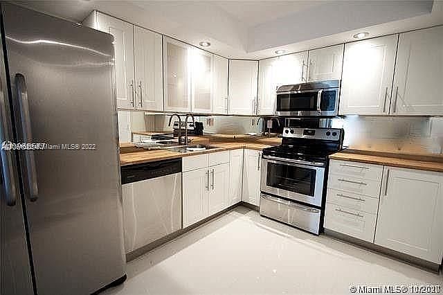 1st image of 9500 W Bay Harbor Dr APT 3F