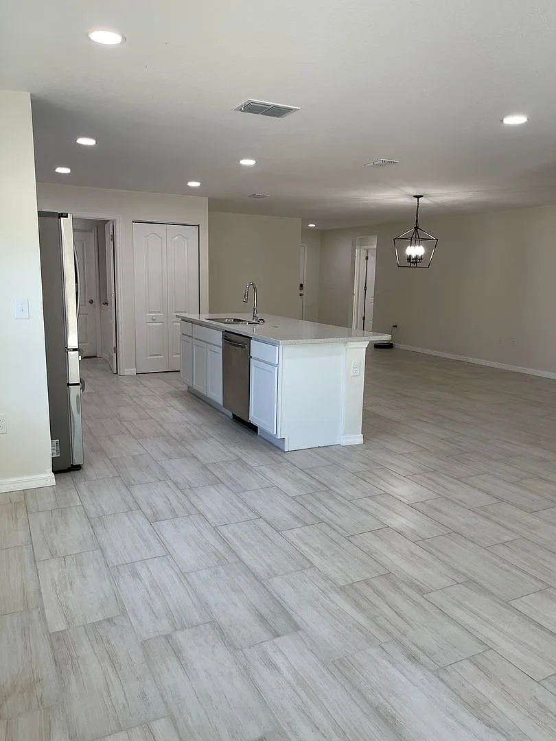 Beautiful four bedroom, two bath, two car garage and a half acre lot — Photo 2