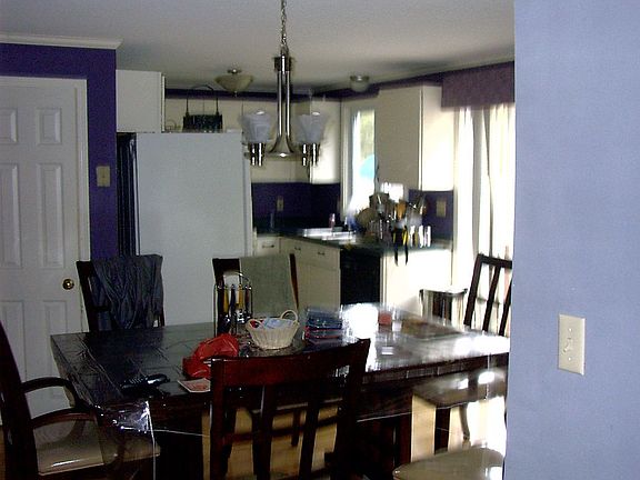 Dining Area   Partial Kitchen View