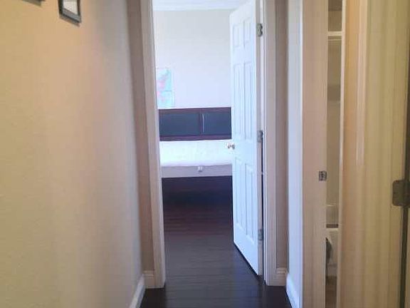 walkway from the kitchen to bathroom and bedroom