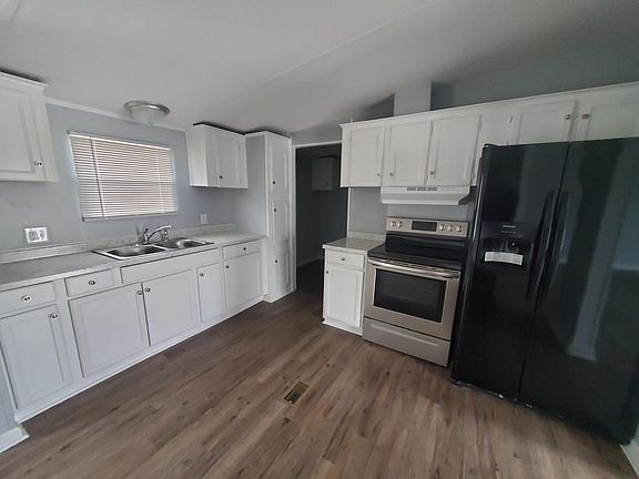 Kitchen. New countertops, appliances, and cabinets.