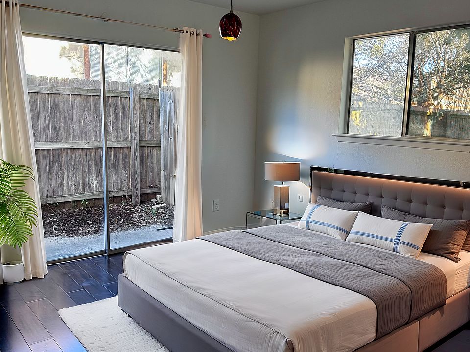 Master bedroom w/ sliding door access outside