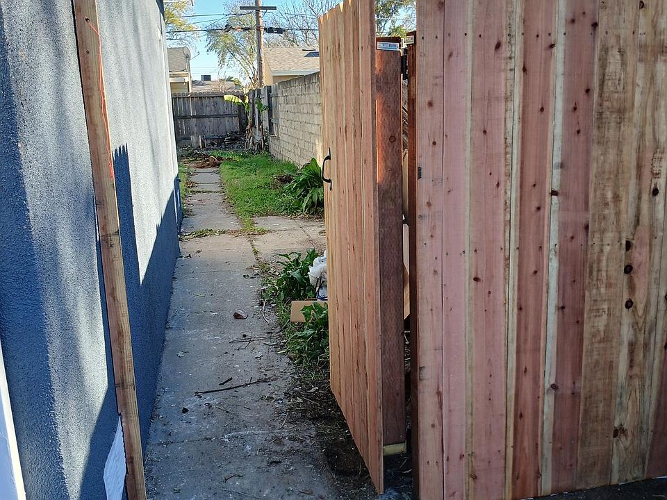 new gate at the right side of the property
