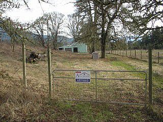 Two metal barns, 5 stalls