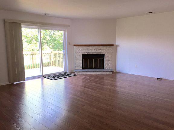 Large living room with working fireplace!