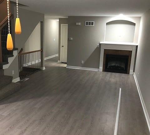 Large Main Floor Living Area with Beautiful New Flooring