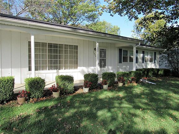Enjoy your morning on the front porch of 1636 Apple Lane