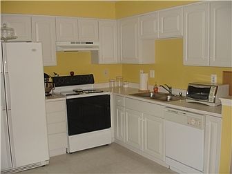 Country Kitchen in rear, 18' x 16'