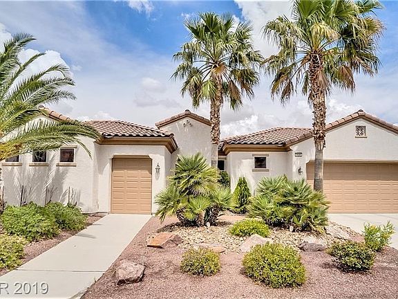 This beautiful Trenton Model features a Golf Cart Garage