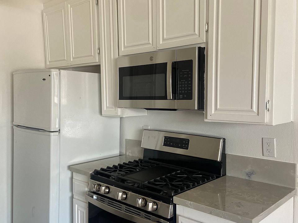 Brand new appliances in kitchen with nice dining space next to it