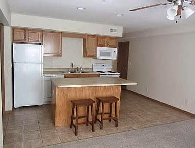 Kitchen for ANK Rentals. Door on right is large pantry/closet.