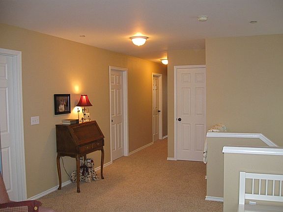 white 6-panel doors and woodwork. New carpet and paint. 