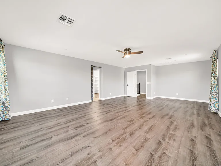 Master bedroom overlooks the community pool