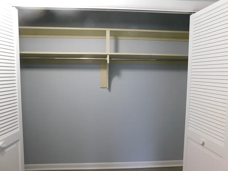 The next closet on the north side of the hallway is about 8.3' x 2.4'.