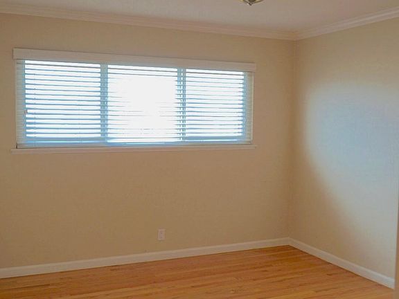 Master bedroom, window-side view.