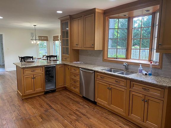 eat in kitchen with 3 bar stools