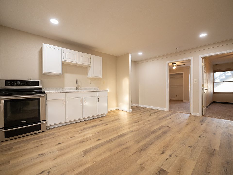 The refrigerator which is included will go to the right of the cabinets.