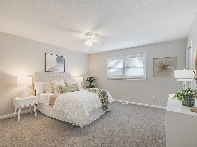 An oversized bedroom with flexible space for sleeping, working, or relaxing.