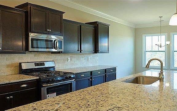 Granite counters, cabinets are actually white