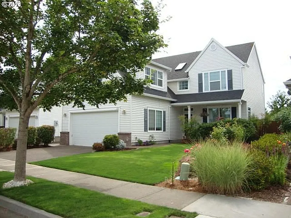 1124 NE Morning Sun Dr photo 1