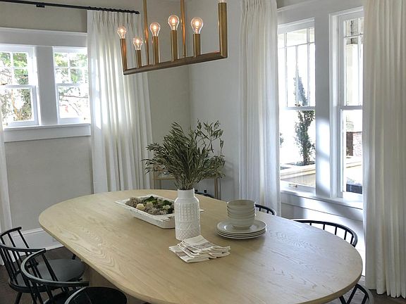 Designing dining room table and seating for 8.