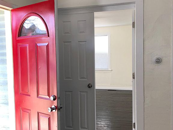 Front door of house leading to living room