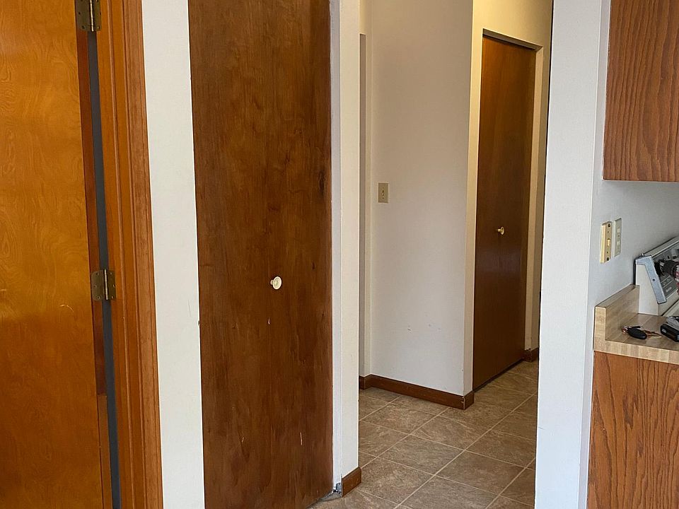 Half bath doorway, pantry, storage, coat closet