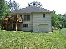 Spacious backyard with deck for those summer cookouts