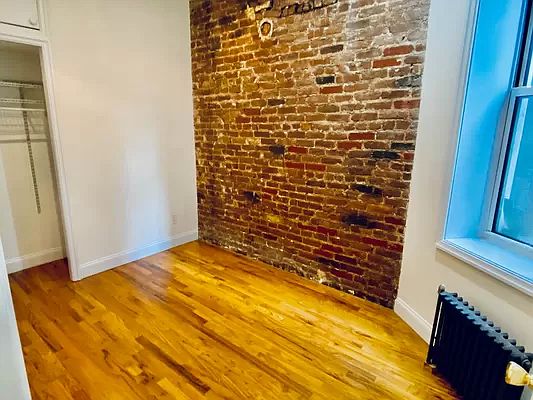 2nd image of 114 E 1st St APT 9E