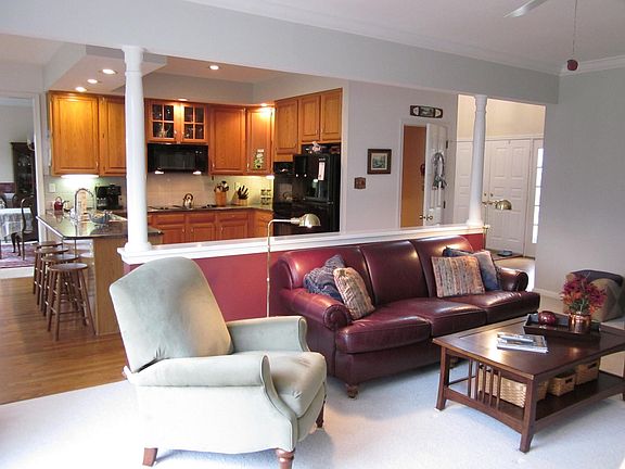 Family room opens to kitchen and breakfast room