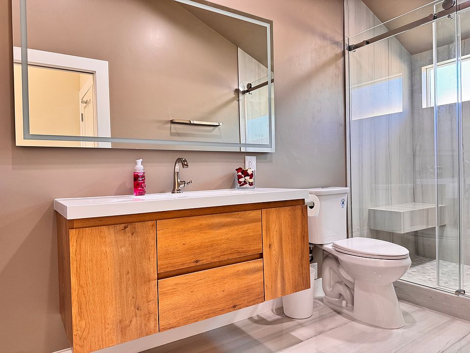 Bedroom 1 Private Bath -Standing shower with built in bench.