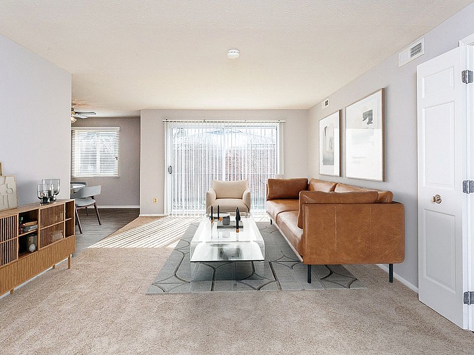 Large living room and dining room with sliding door to balcony or terrace