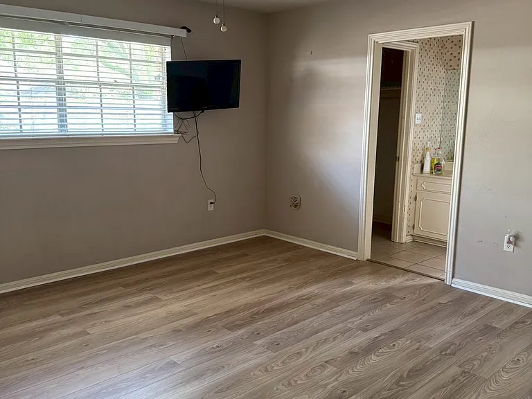 ___ Master Bedroom
"Large master bedroom with new flooring and calming natural light _ a peaceful retreat at the end of your day."
