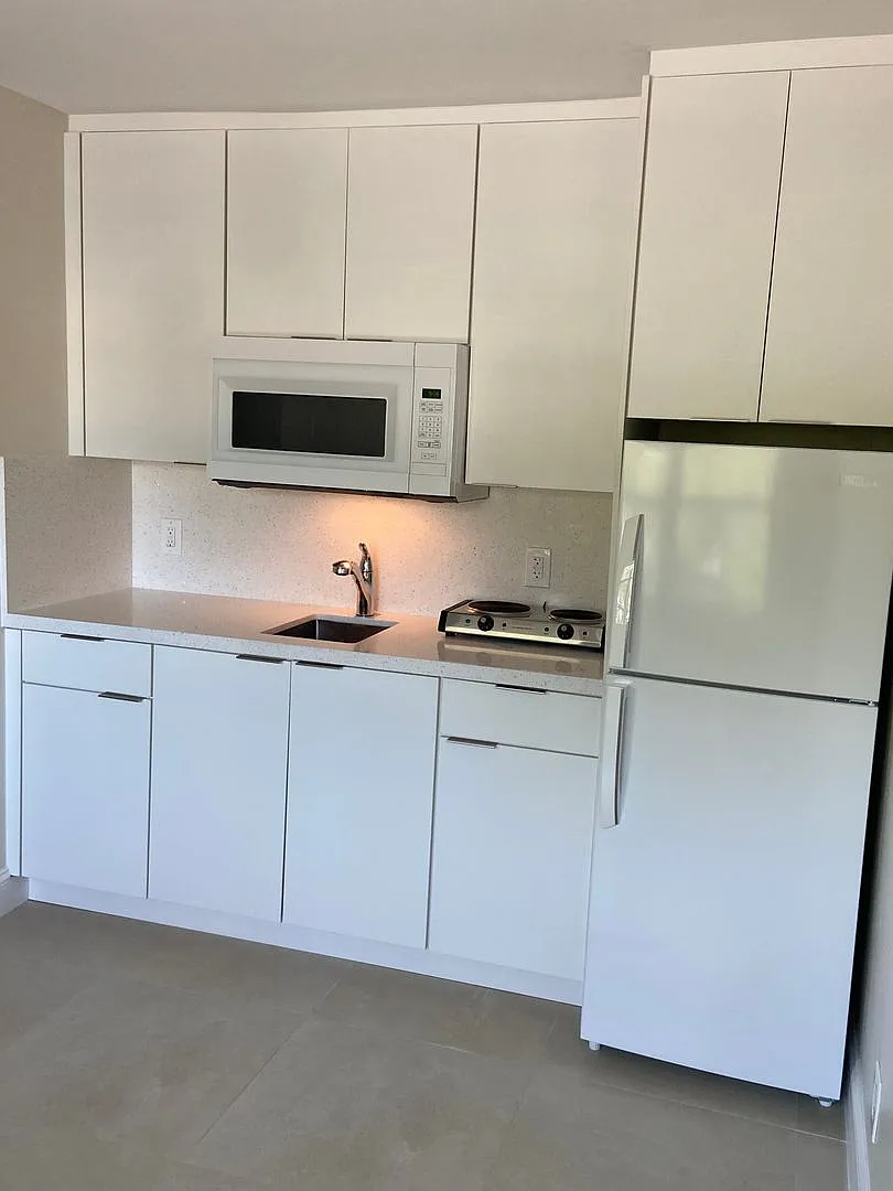 GEM COVE APARTMENTS — Photo 4
