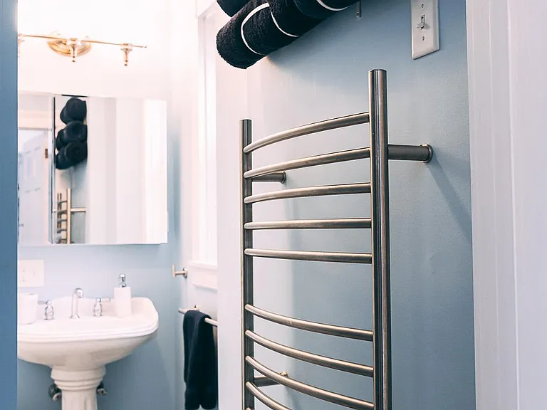 There's a bathroom with tub and shower just off the master bedroom.