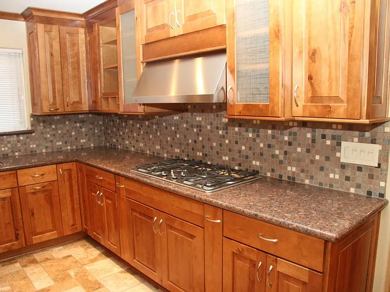 Granite counter + Upgraded cabinets