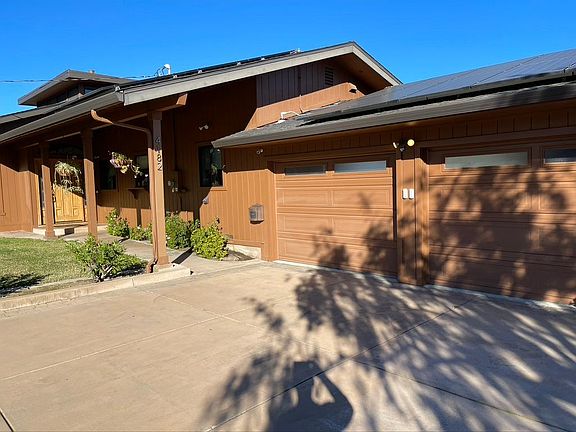 Front entry and secure carport.