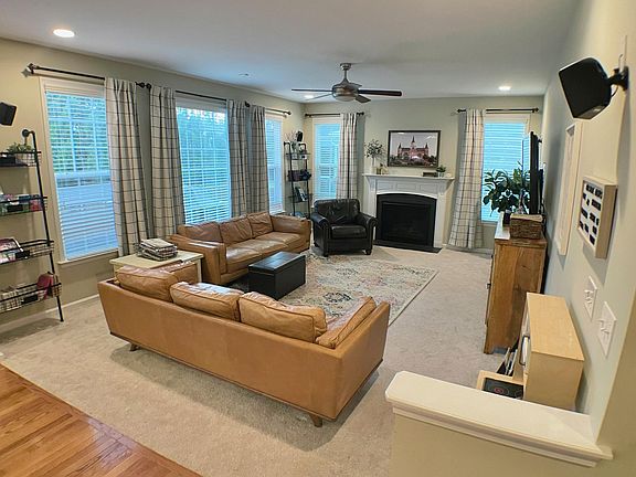 Family room. Wired for surround sound. Natural Gas Fireplace. Kitchen and breakfast nook on left.