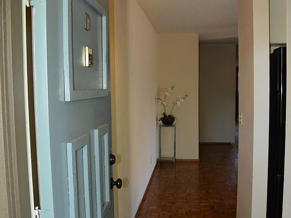 Entrance, hardwood floors in unit