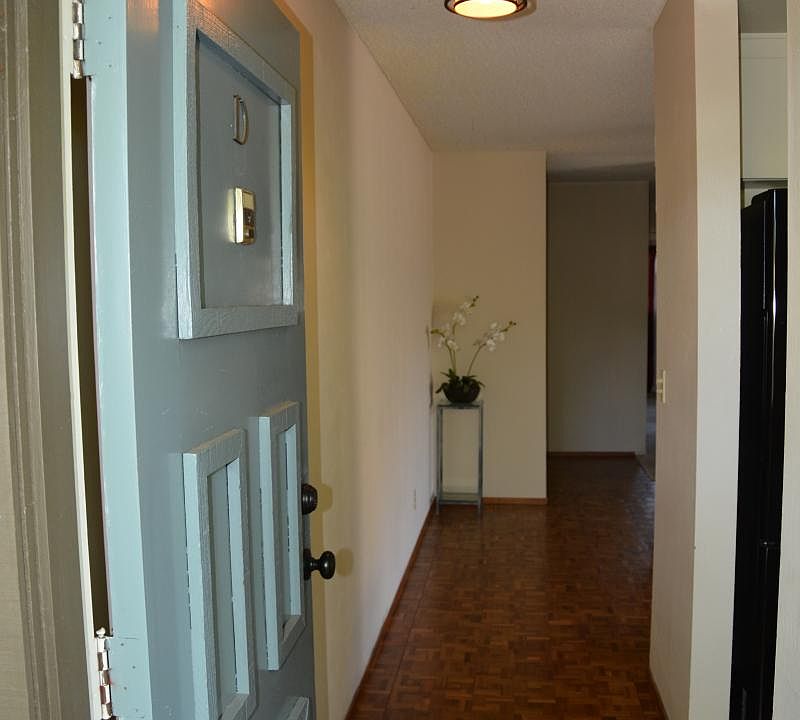 Entrance, hardwood floors in unit